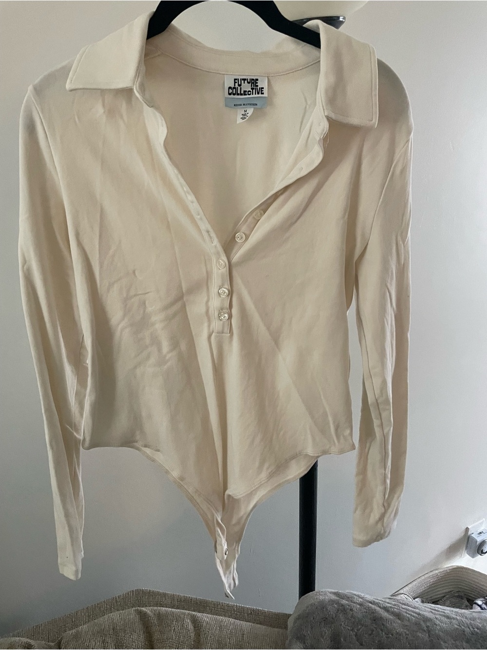 Future Collective Cream Long-Sleeve Button Bodysuit